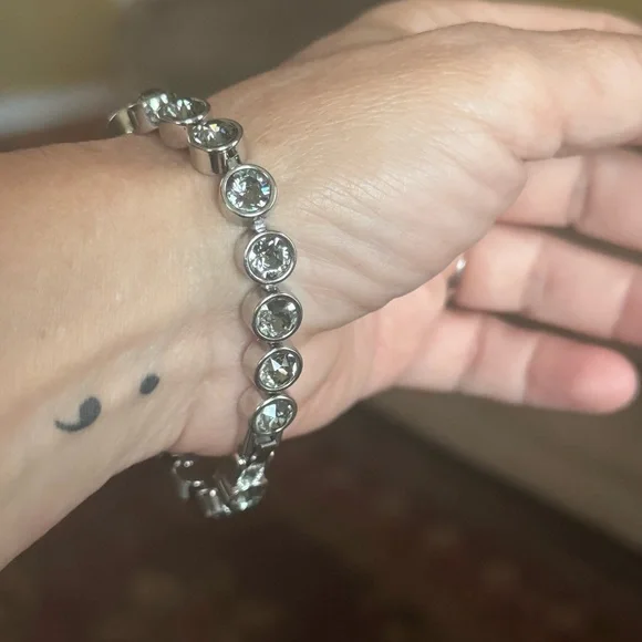 Touchstone Crystal Silver Tennis Bracelet - Picture 4 of 7